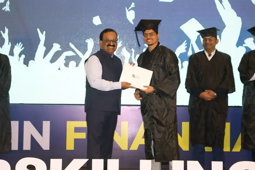AAFM India student receiving certification on stage